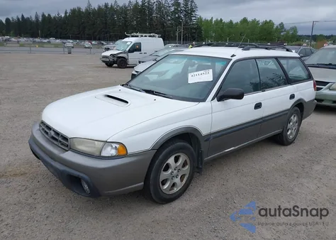 1999 Subaru Legacy из США, поврежденный, VIN 4S3BG6854X7625641